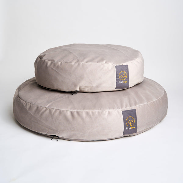 Large and small dog beds in light grey velvet