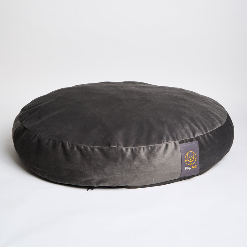 Large round dog bed in dark grey velvet