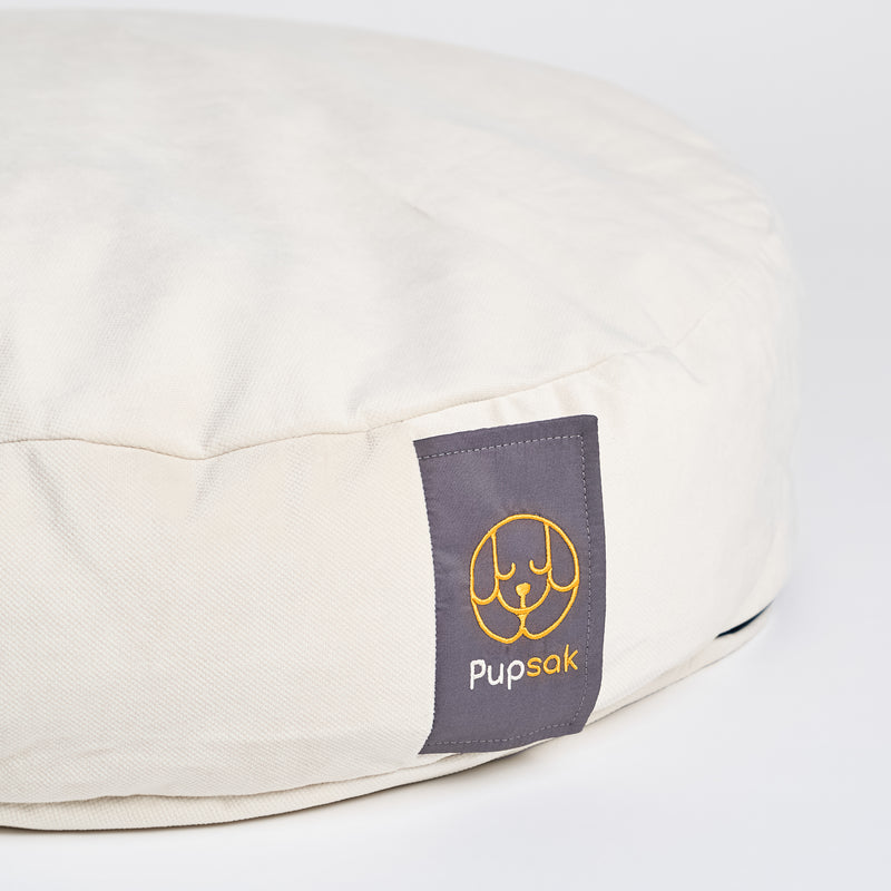 Dog bed and pillow in creme velvet